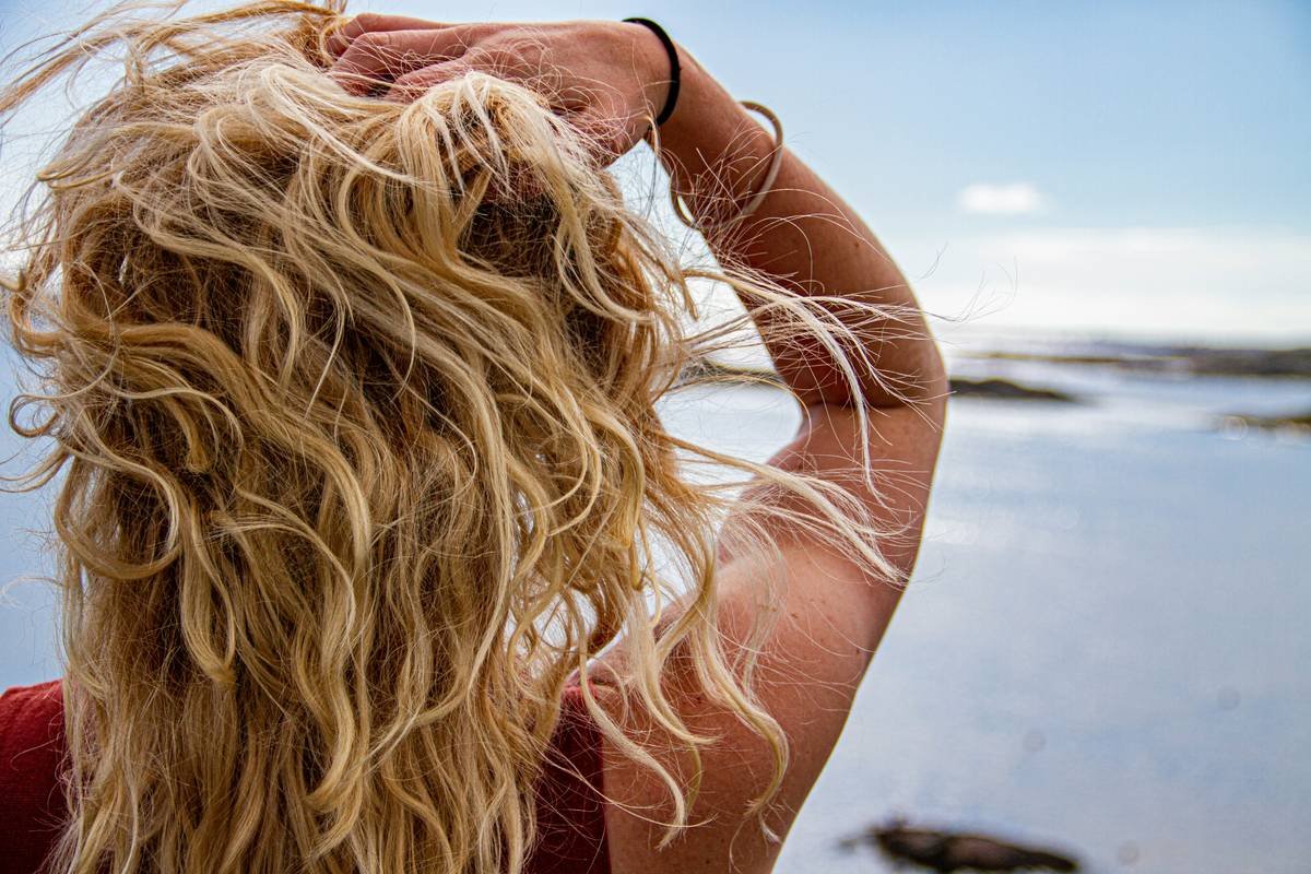 Why Your Hair Is Secretly Burning in the Sun—And How a Sun-Protect Hair Spray Saves It